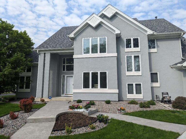 Image a of house after stucco restoration